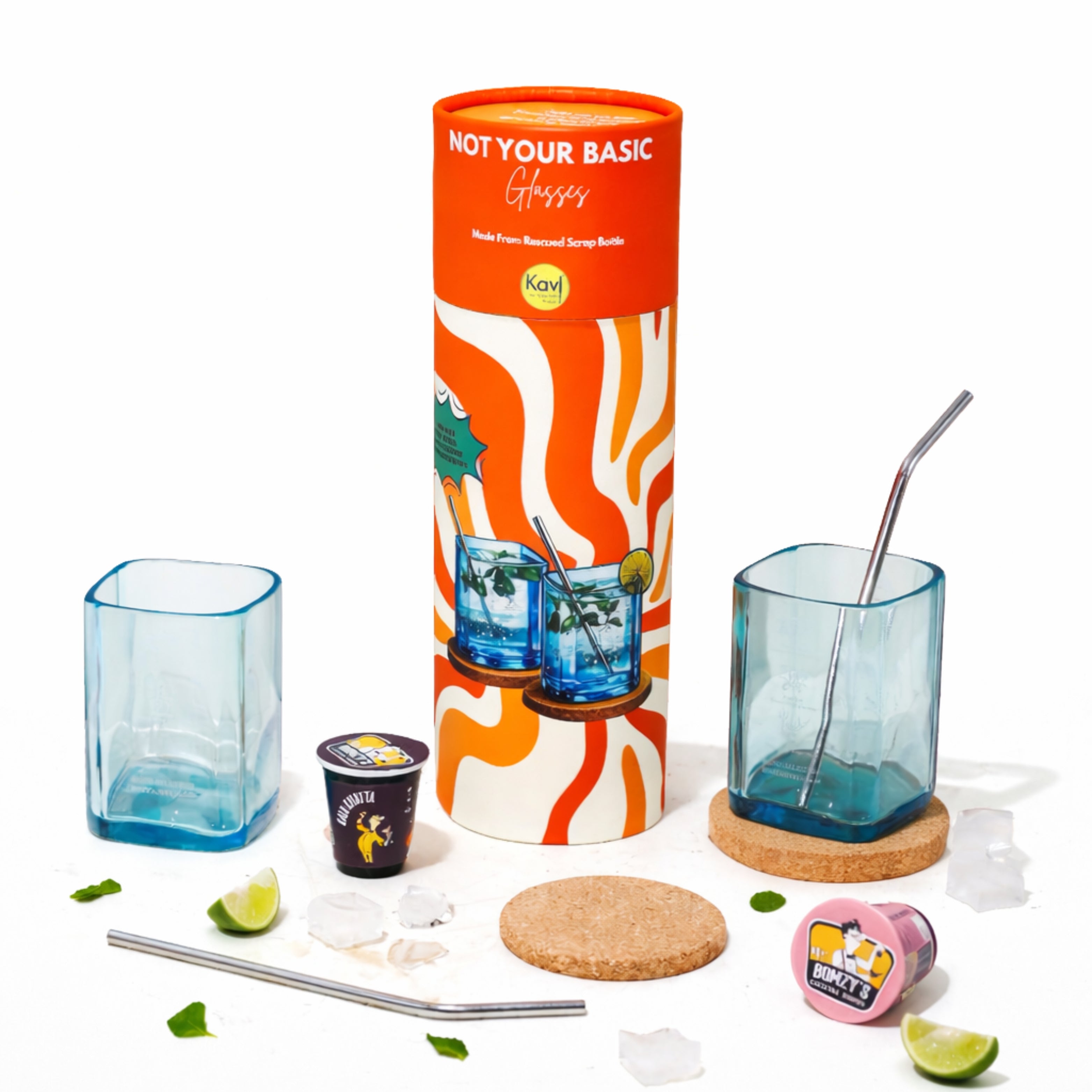 Set of blue glasses, a colorful box, and accessories on a white background