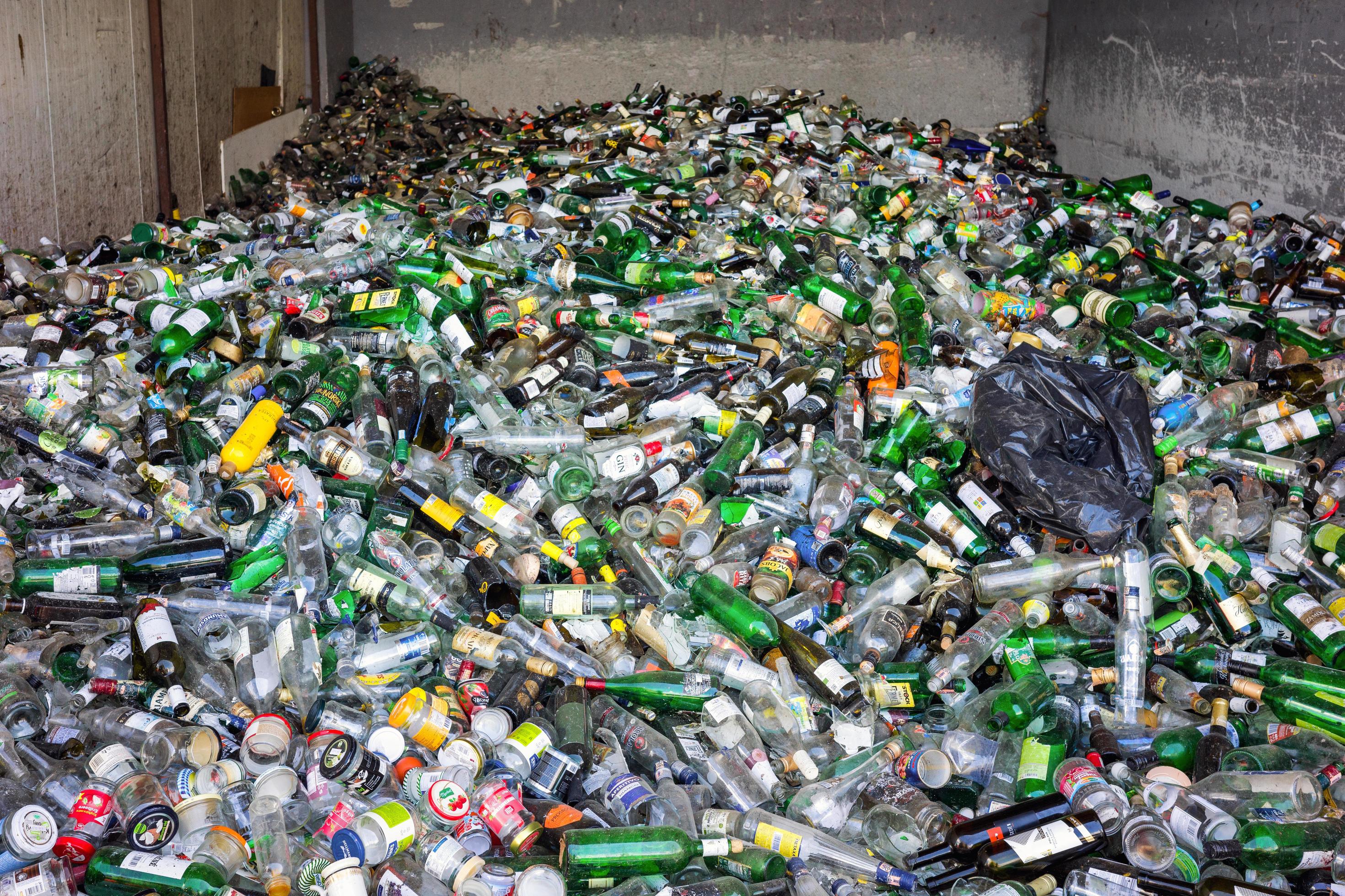 landfill-full-of-colored-glass-bottles-free-photo